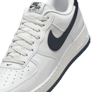 Side view of Nike Air Force 1 '07 men’s shoes in white leather